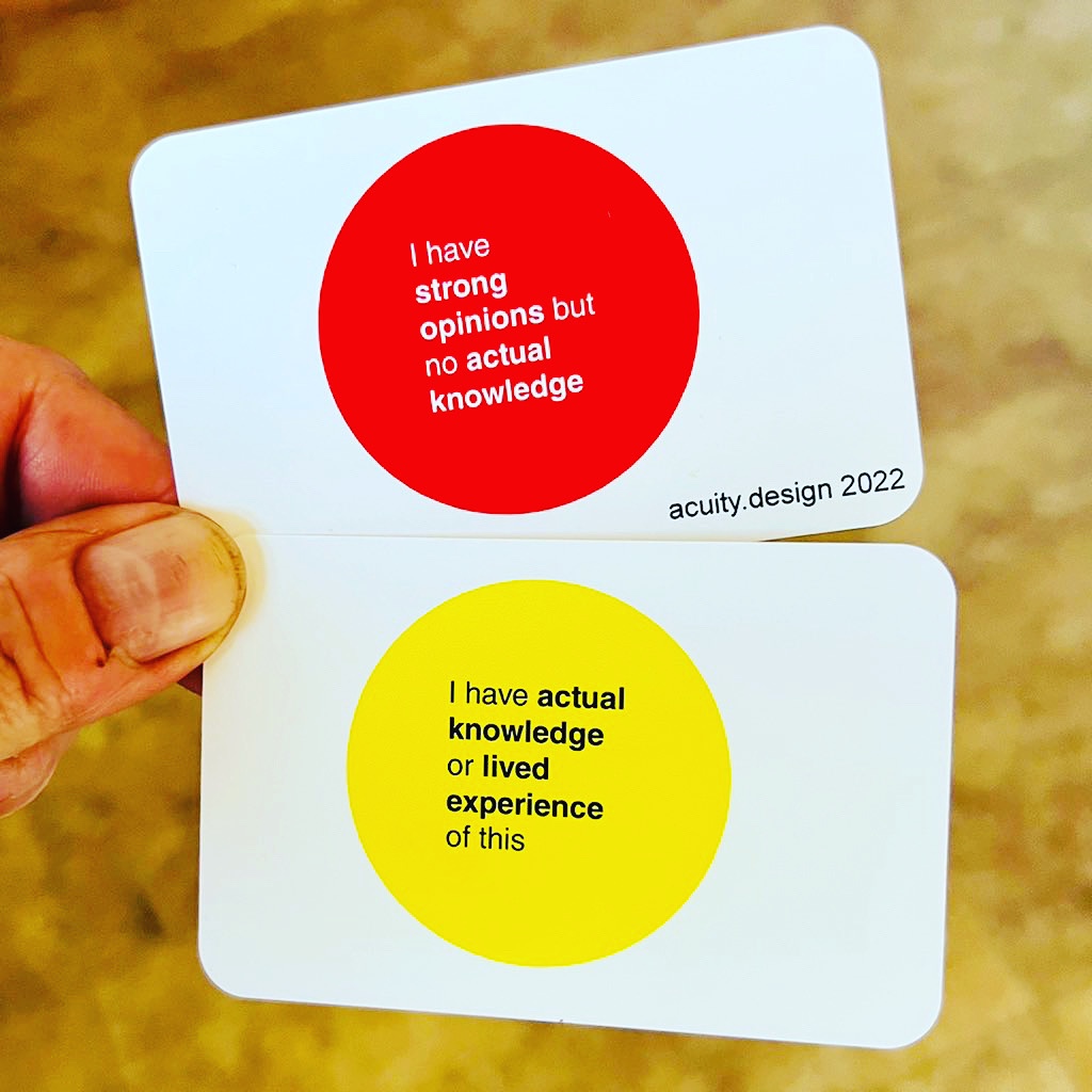 The two sticker messages on either side of a business card