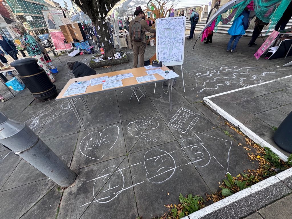Pop up table about imagining futures in Stroud town square