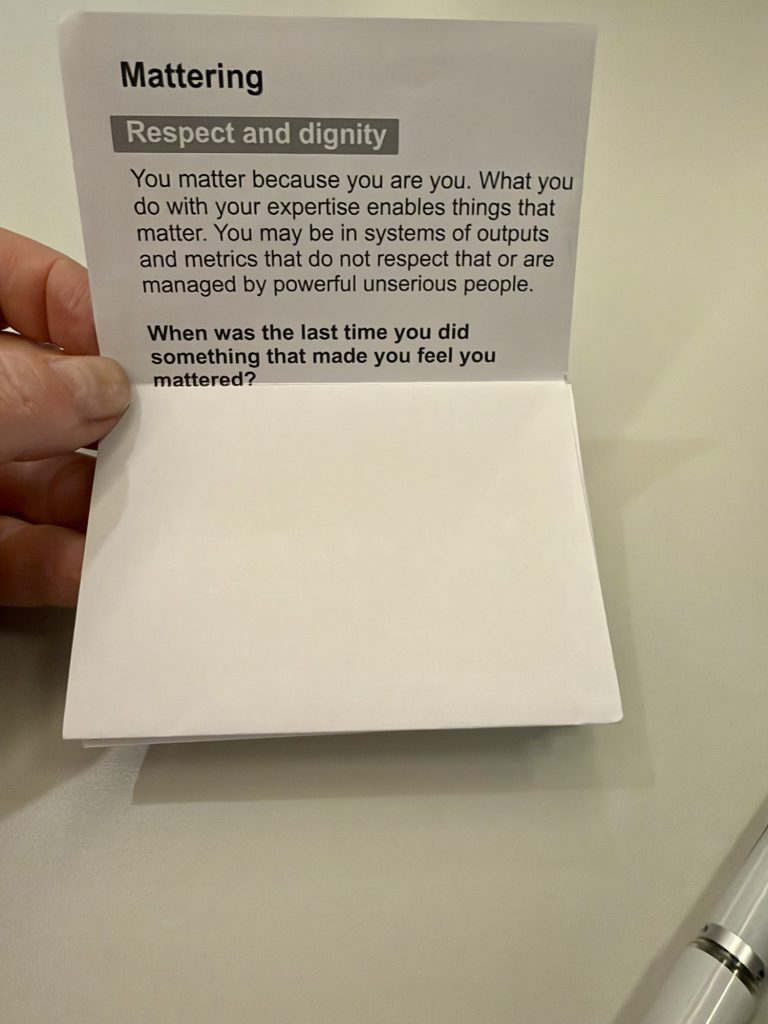 The Mattering page has a some lines on how individuals matter and how that sense can be disturbed by ai and bad managers. The question is left with 1/2 page to fill in by participant.